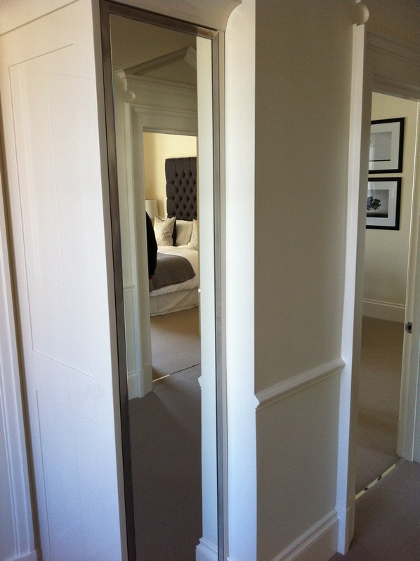 Full-length wardrobe mirror fitted in Golders Green home