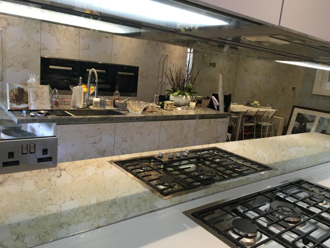 Mirror glass splashback in Golders Green luxury kitchen